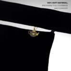 A luxury Imported Saudi niqab laid flat, displaying its elegant shape, color, and fine stitching. Modify.pk