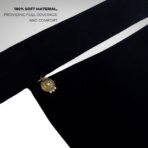 A luxury Imported Saudi niqab laid flat, displaying its elegant shape, color, and fine stitching. Modify.pk