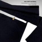 A luxury Imported Saudi niqab laid flat, displaying its elegant shape, color, and fine stitching. Modify.pk