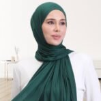 Jersey Hijab styled in a simple wrap, showcasing its fluid drape. Modify.pk