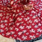 A woman using a Winter Namaz Chadar, performing namaz. Modify.pk