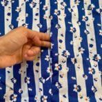 A woman using a Winter Namaz Chadar, performing namaz. Modify.pk