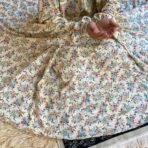 A woman using a Winter Namaz Chadar, performing namaz. Modify.pk