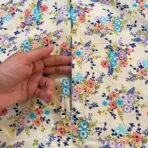 A woman using a Winter Namaz Chadar, performing namaz. Modify.pk