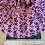 A woman using a Winter Namaz Chadar, performing namaz. Modify.pk