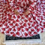 A woman using a Winter Namaz Chadar, performing namaz. Modify.pk