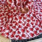 A woman using a Winter Namaz Chadar, performing namaz. Modify.pk