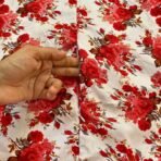 A woman using a Winter Namaz Chadar, performing namaz. Modify.pk