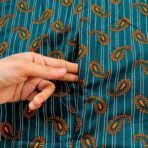 A woman using a Winter Namaz Chadar, performing namaz. Modify.pk