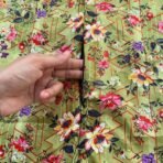 A woman using a Winter Namaz Chadar, performing namaz. Modify.pk